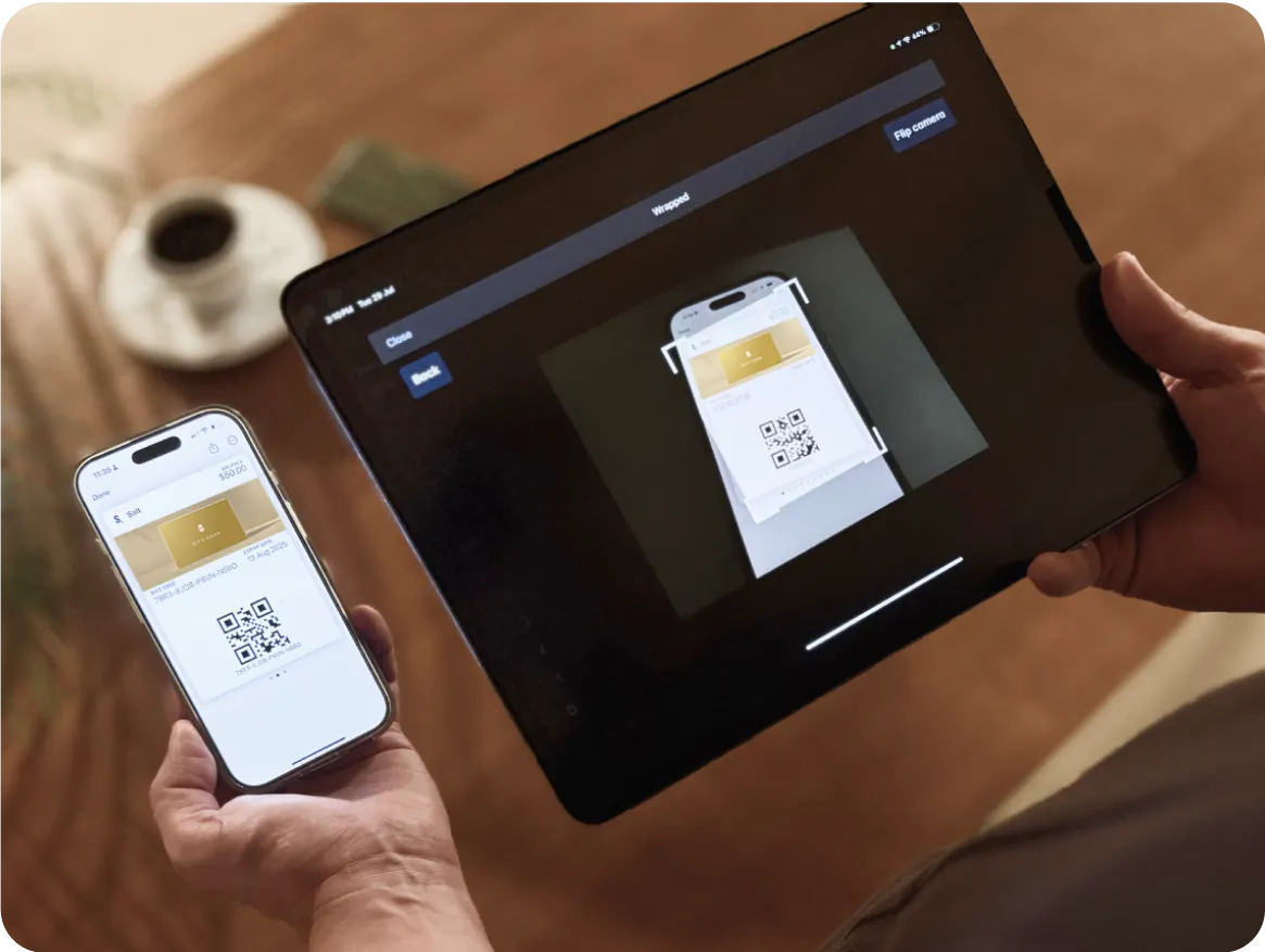 Gift card being scanned into POS for payment